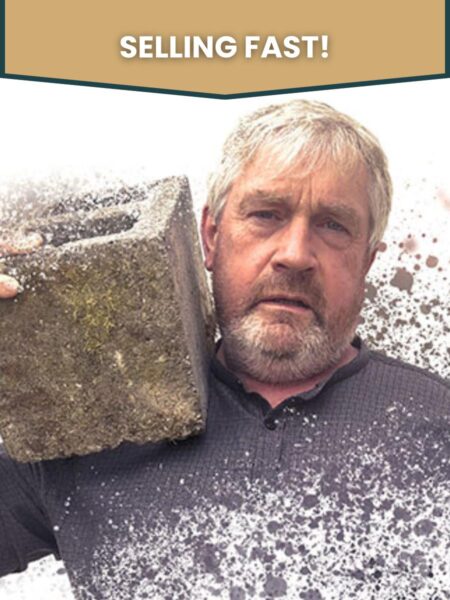 Seamus O'Rourke carrying a cement block on his shoulder in Indigestion overlaid with the words Selling Fast