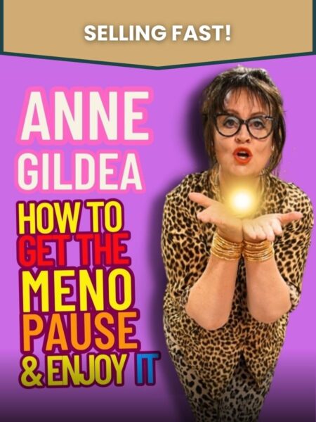 Anne Gildea wearing a leopard-skin suit, blowing a kiss to the camera whilst holding an orb of light in her outstretched hands for Anne Gildea - How To Get the Menopause and Enjoy It. The words "selling fast" are overlaid at the top of the image.