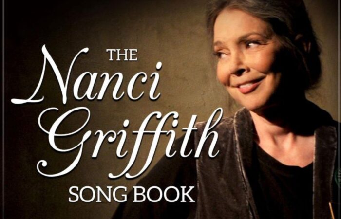 Image of Nanci Griffiths looking to her right and smiling, overlaid with the words: "The Nanci Griffith Song Book"