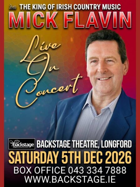 A concert poster featuring a man smiling against a red and blue background with musical notes. Text reads "The King of Irish Country Music, Mick Flavin, Live in Concert."