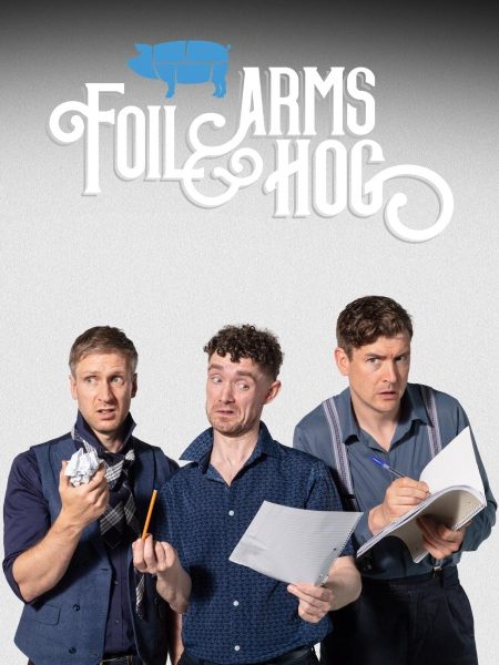 The three members of Foil Arms and Hog stand against a light grey background with exaggerated, puzzled expressions while holding notepads, paper, and pencils, suggesting a comedy writing session. The show's stylized white logo appears above them with a blue pig icon.