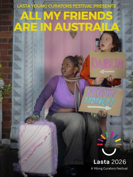 “All My Friends Are in Australia,” featuring two performers outside a pink front door holding cardboard signs pointing towards Dublin, Perth and Sydney, with a pink suitcase in the foreground. Text reads “Lasta Young Curators Festival Presents” and “Lasta 2026 – A Young Curators Festival.”
